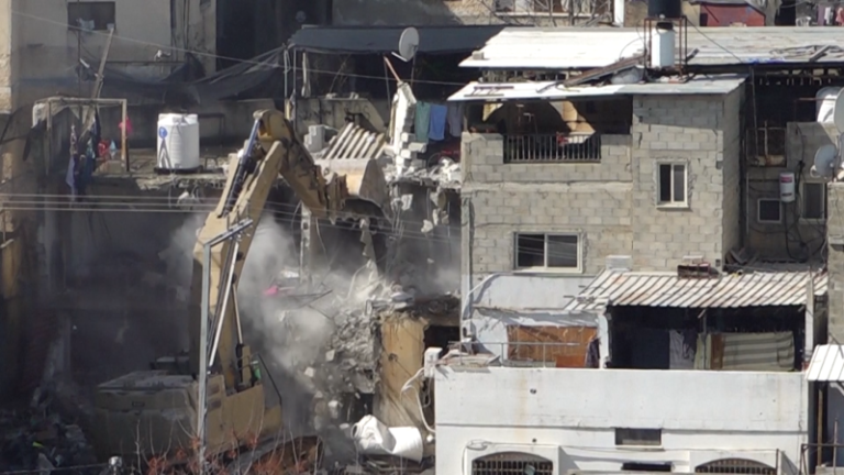 Israel demolishes West Bank apartment buildings as military campaign displaces tens of thousands of Palestinians